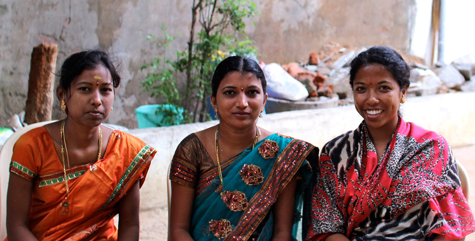 three women in saris