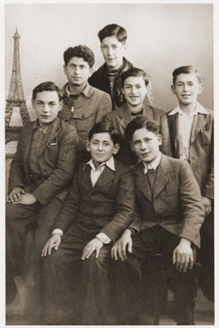 Some of the Buchenwald Boys are pictured in France after being liberated from the camp. Waisman is on the far right.