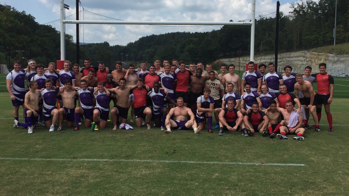 Furman and VMI enjoy a post game photo.
