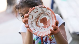 Furman art students and kids from the Frazee Center crafted bowls to benefit Loaves and Fishes.